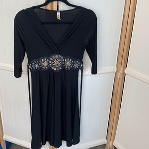 Black long sleeve dress with belt, rhinestone and sundial belt